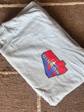 Hummel Light Blue Short Sleeve Tee with Red & Blue Shield Logo
